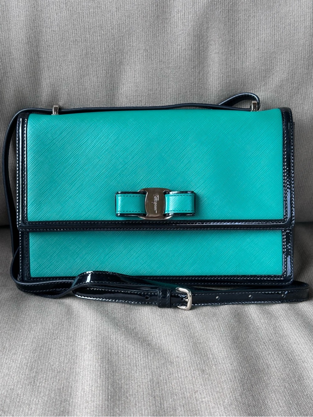Salvatore Ferragamo Teal Crossbody with Black Trim and Bow Charm